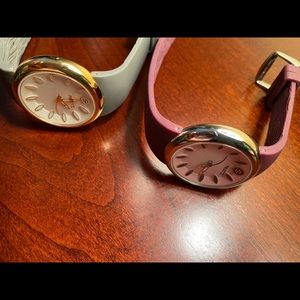 Two Fruitz Phillip Stein watches with rubberized bands. One grey and one maroon